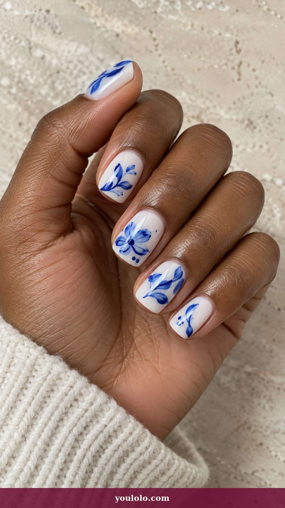 Italy Nails idea 17: Puglia Ceramic Blue on a realistic feminine hand