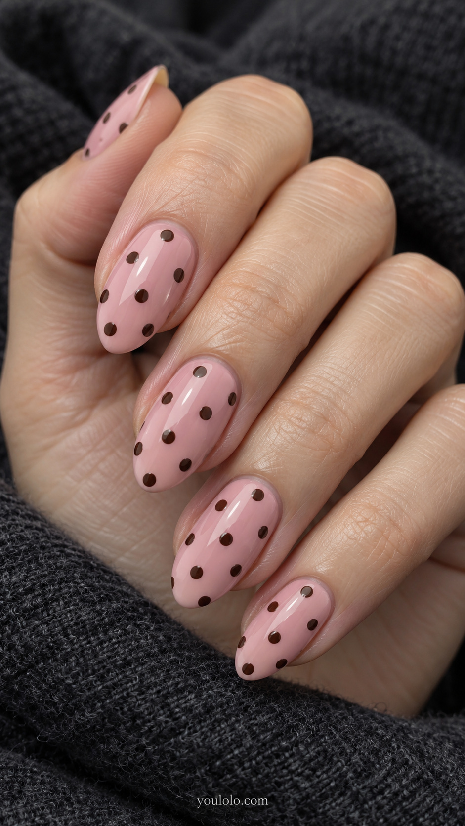 Brown dots on soft pink manicure