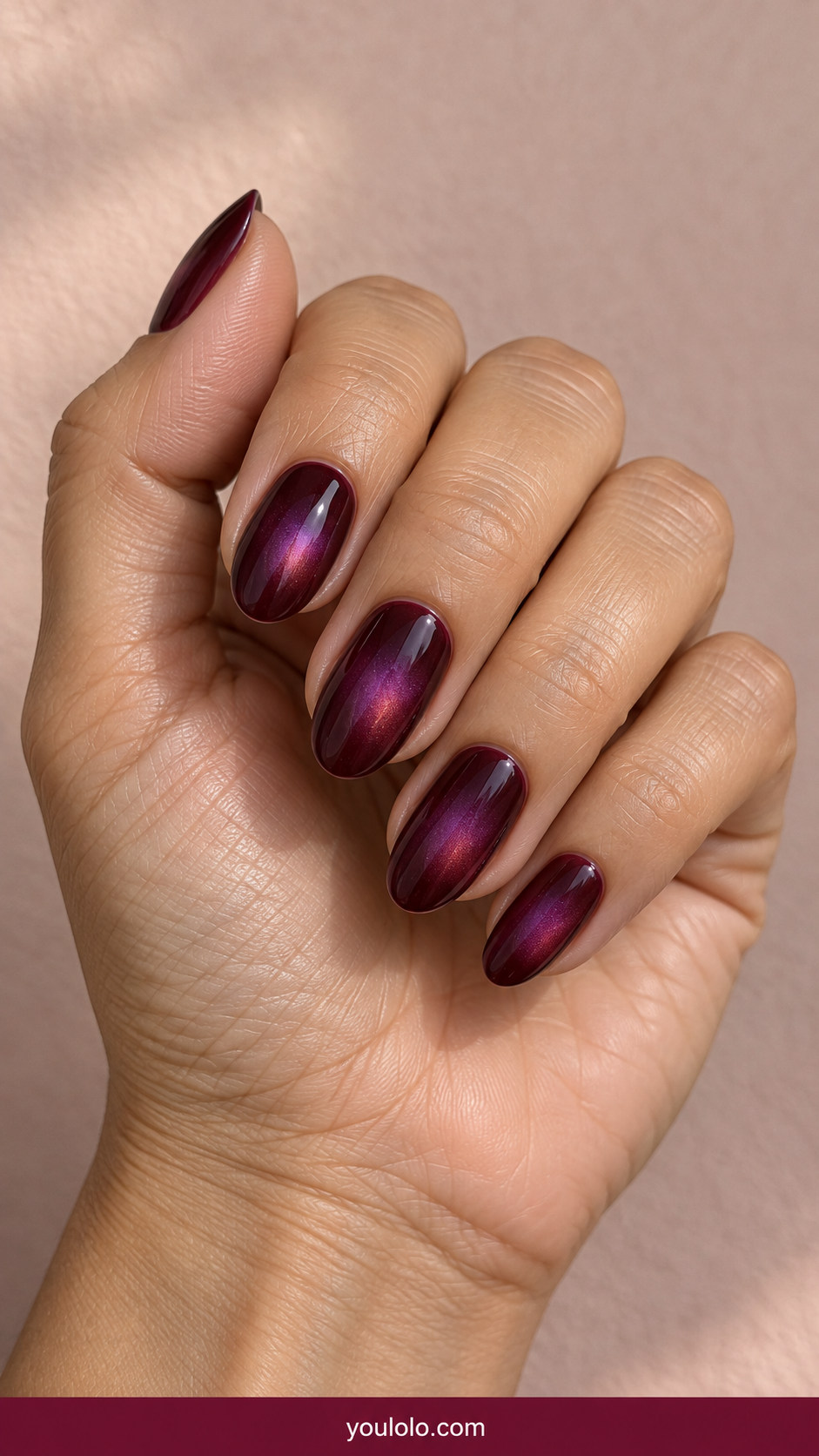 Aura Nails idea 18: deep berry nails with violet diffused inner glow on an anatomically realistic feminine hand