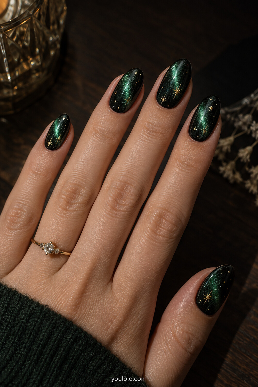 Deep emerald black magnetic cat eye nails with jewel green glow