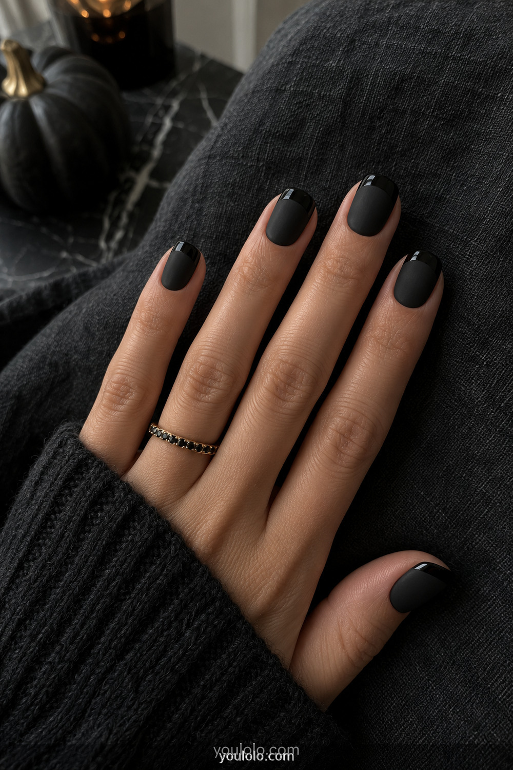 Matte black nails with glossy black French tips for Halloween