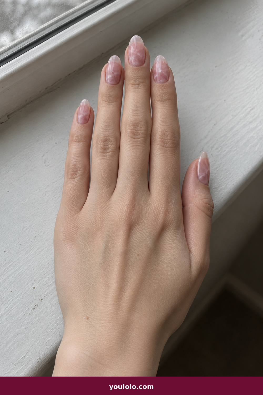 Elegant Almond Nails idea 18: Rose Quartz Edge, medium almond rose-quartz marbling with clean translucent edges