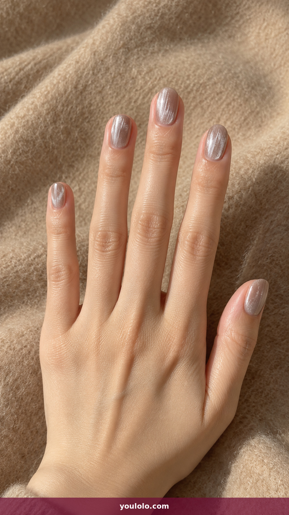 Short Oval Nails idea 18: Soft Silver Ribbed Glass in a realistic fall manicure