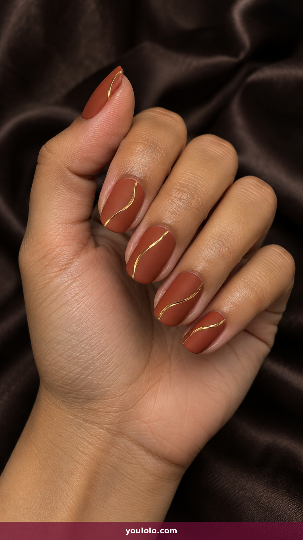 Matte Nails idea 18: Terracotta and Gold Lines in a realistic fall manicure