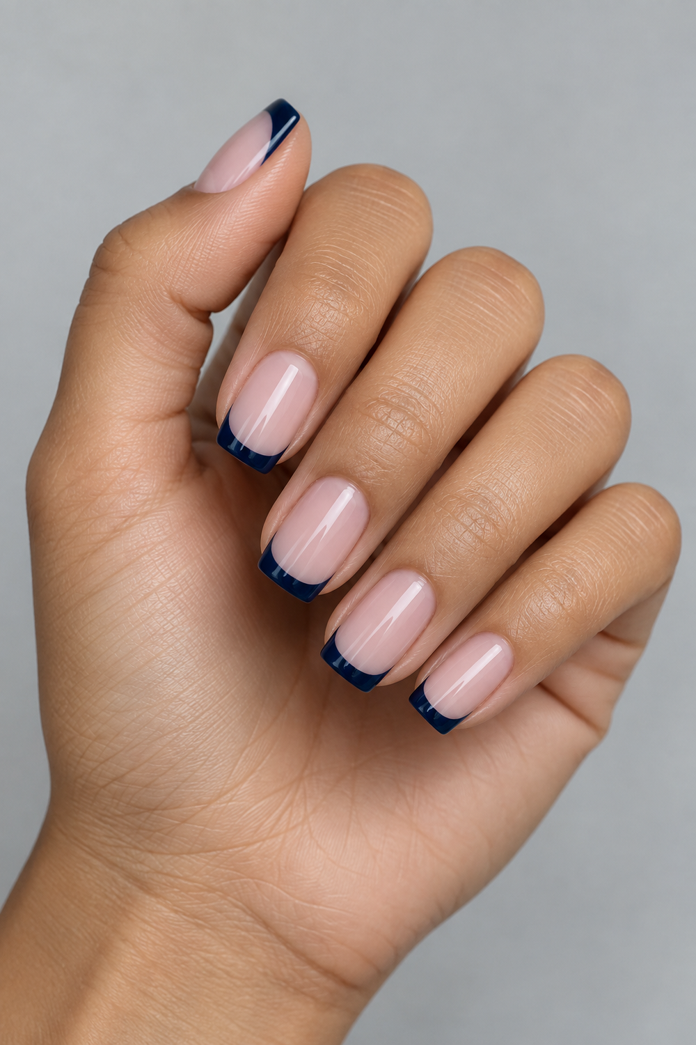 Midnight navy French manicure on medium square nails