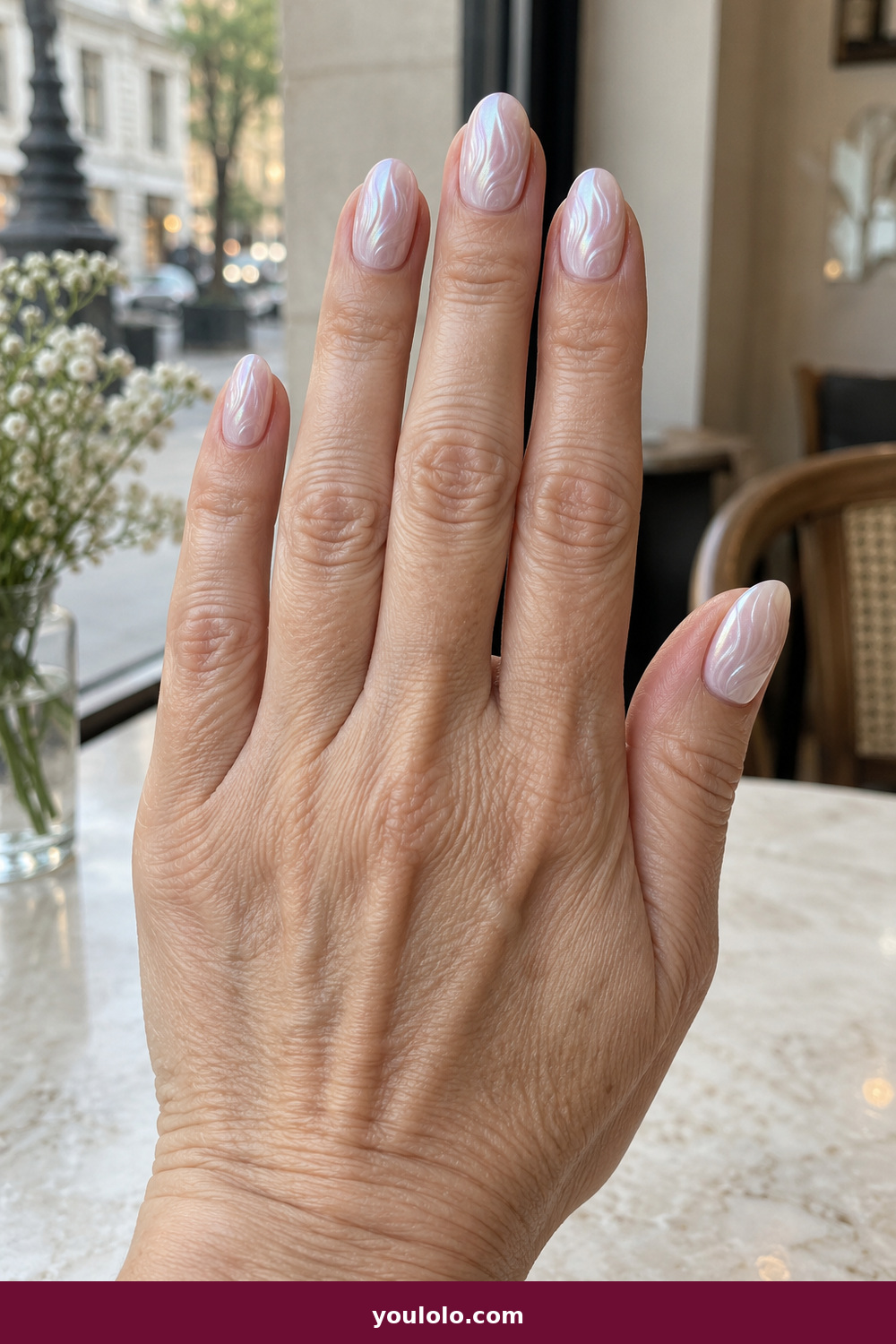Pink and White Nails idea 19: Pink Oyster Shell, medium oval pink-white pearly shell effect with fine curved ridges