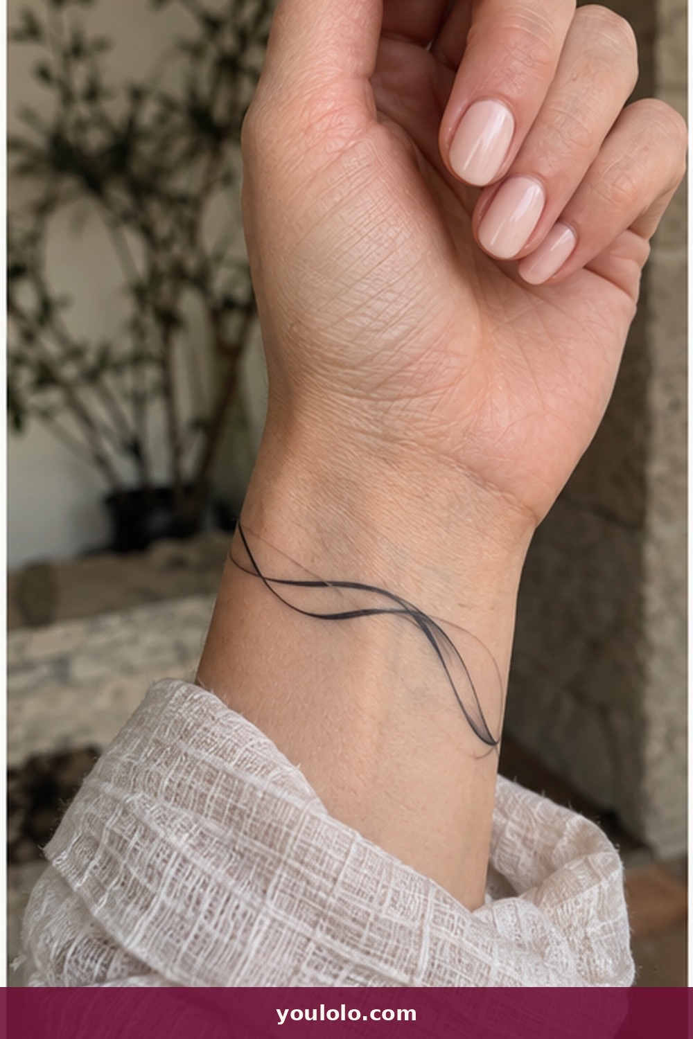 Flowing Abstract Ribbon — idea 21 from Dainty Wrist Tattoos for Women