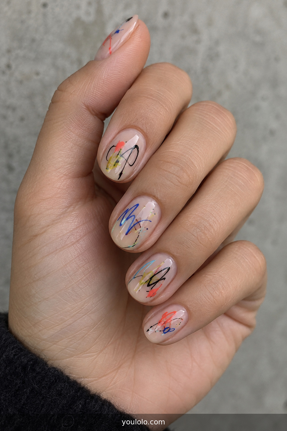 Sheer short nails with colorful fine graffiti scribbles