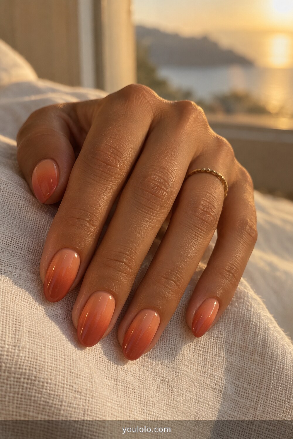 Peach to terracotta sunset ombre nails