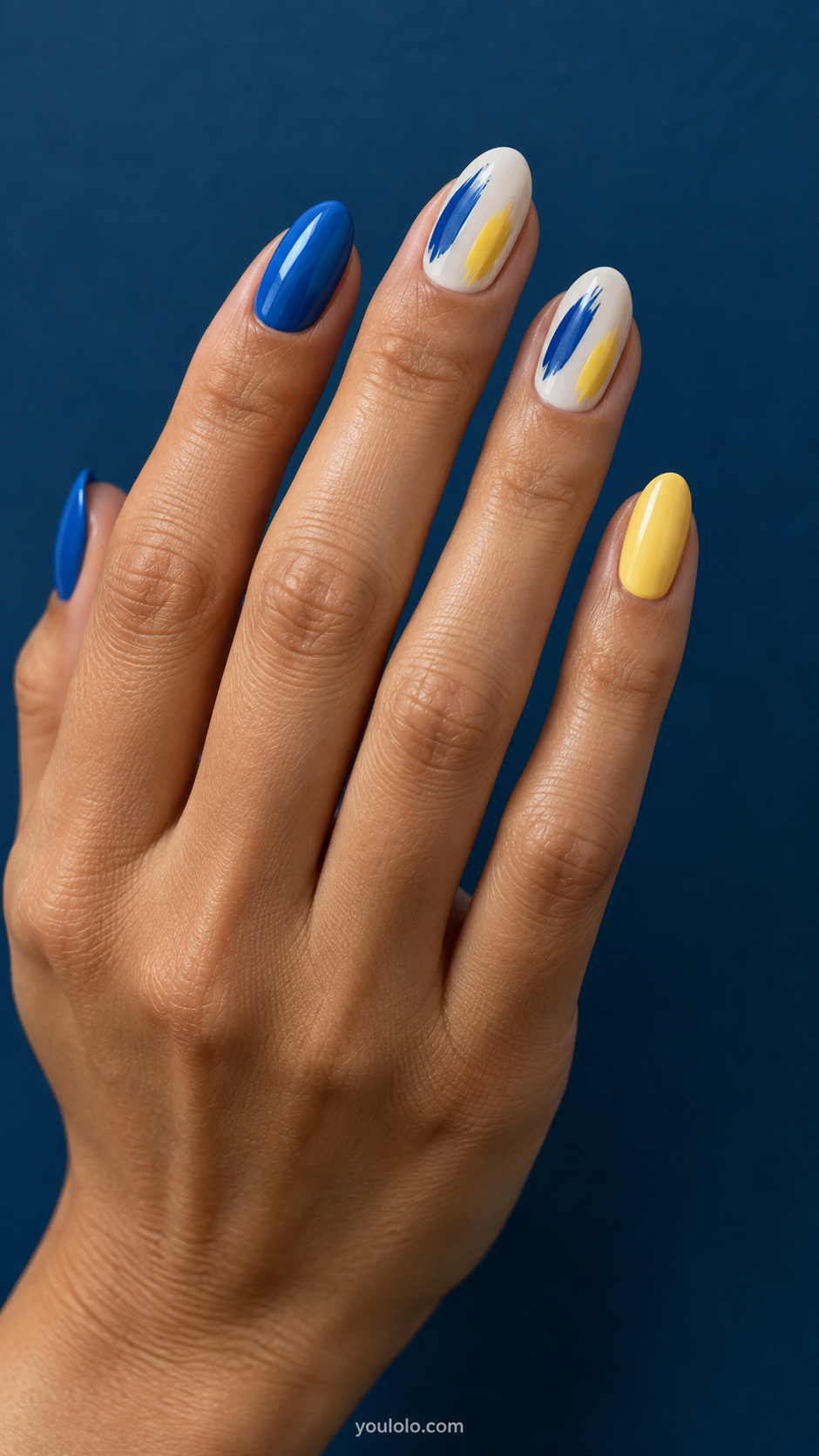 Blue and yellow brushstroke accents manicure