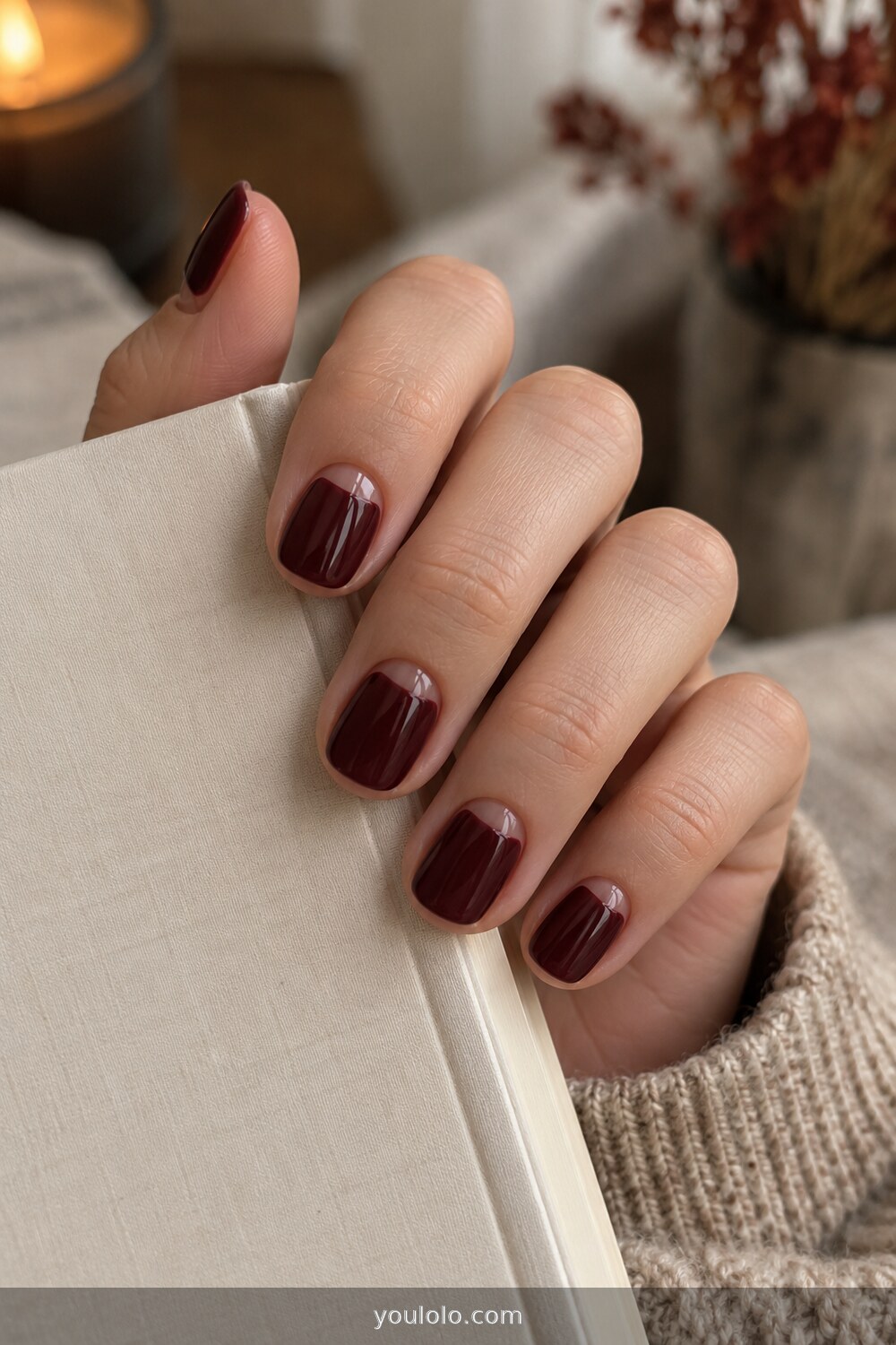 Burgundy negative space manicure on short nails