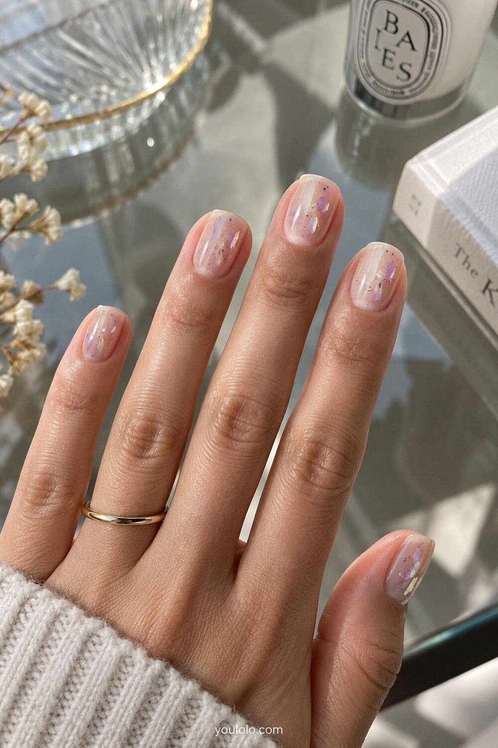 Clear nude nails with sparse holographic foil and lavender jelly wisps