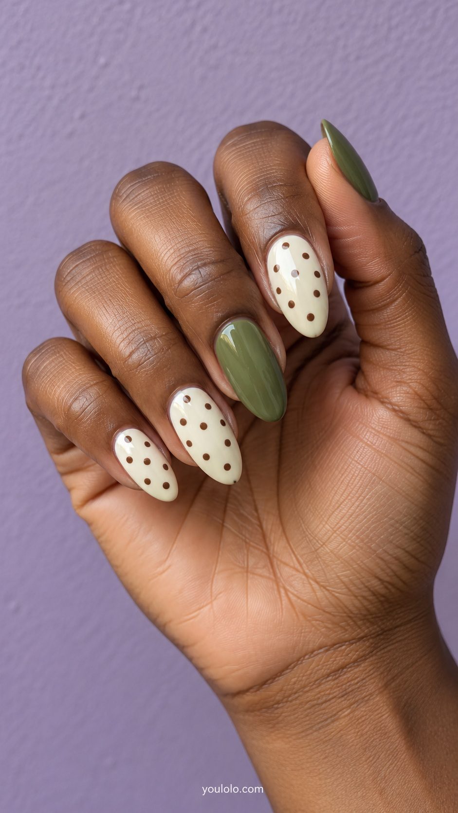 Dotted ivory with olive-green accents manicure