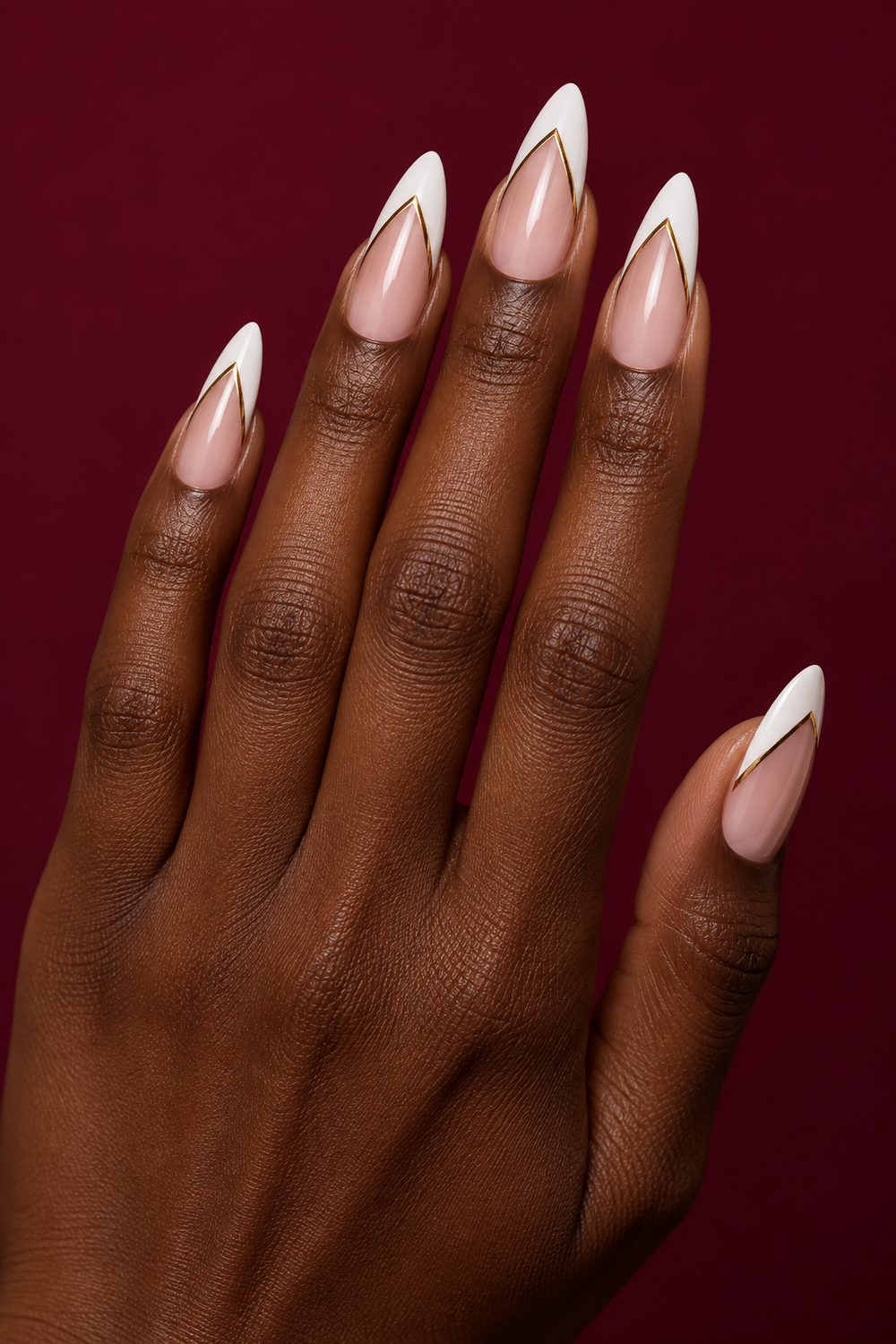 Deep V white French tips with fine gold outlines
