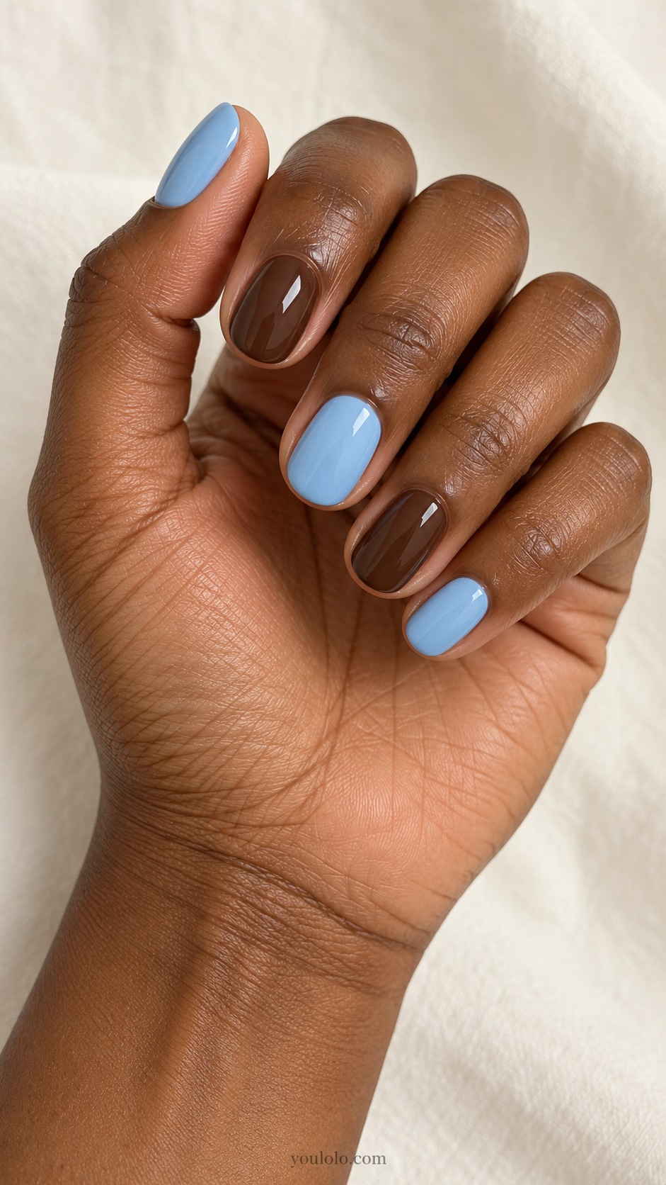 Sky Blue Chocolate Alternation — short oval solid cream alternating sky blue and chocolate brown nails glossy