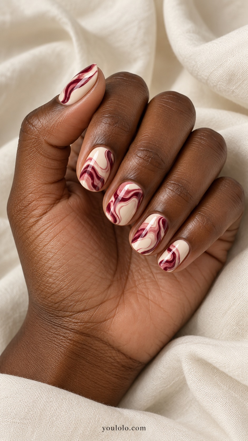 Short oval nails cream base burgundy cranberry red flowing marble swirls no fruit