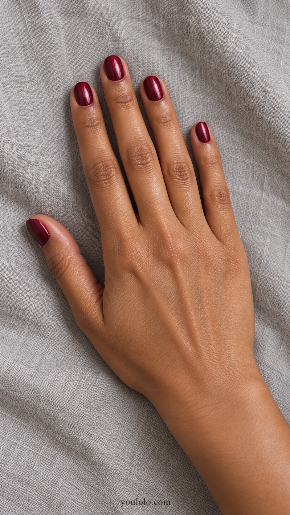 Short round deep red wine burgundy with delicate rosy pearl glaze, visibly red not black