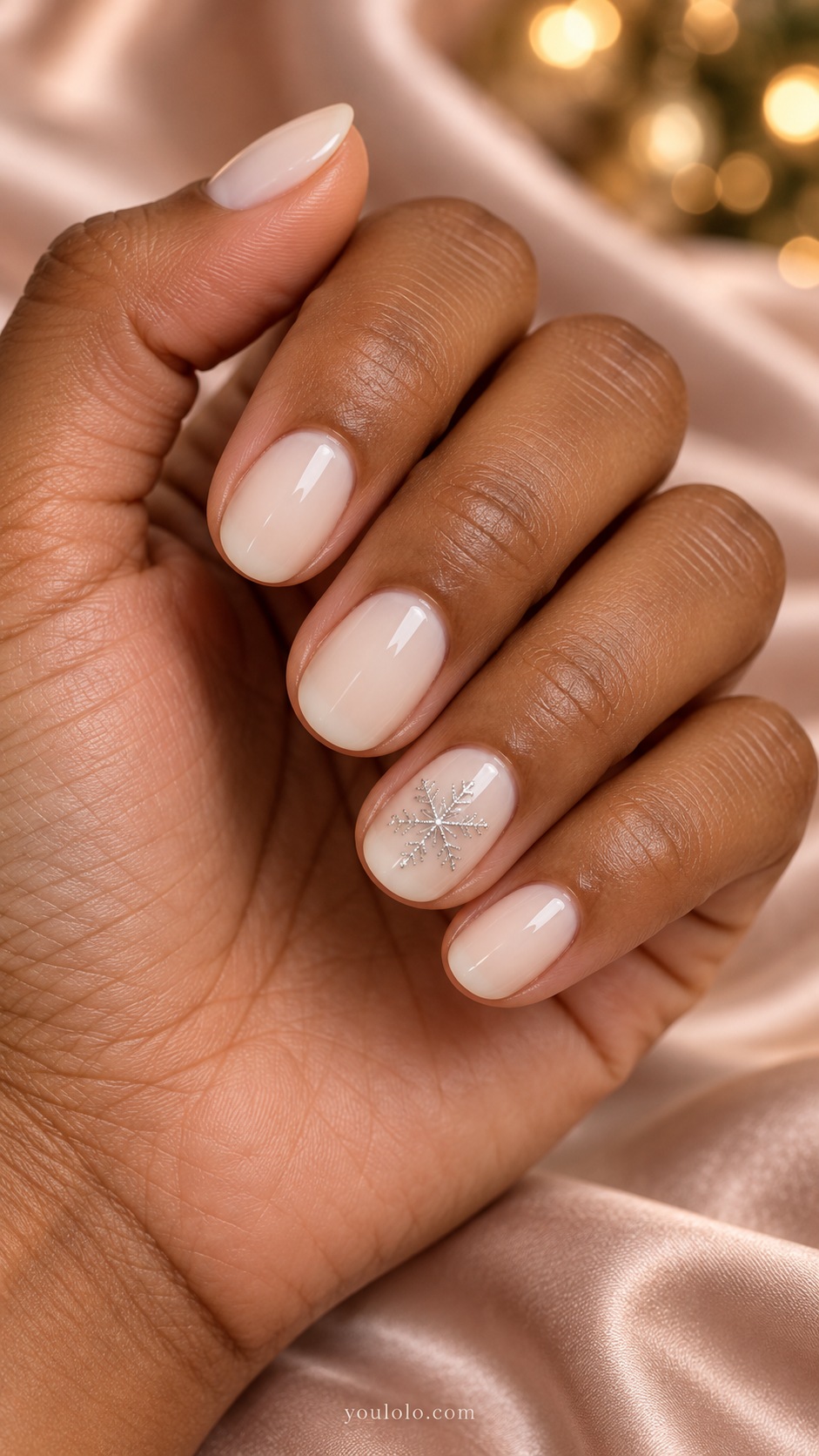 Short oval milky ivory nails one ring nail delicate silver six branched snowflake