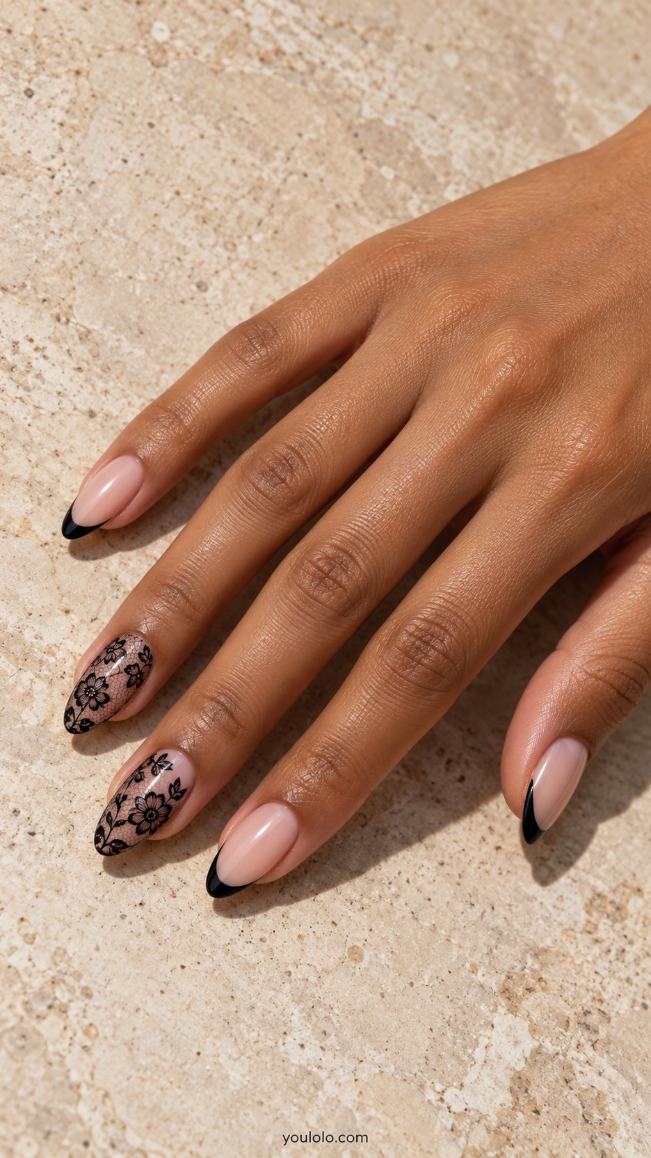 Black Chantilly Accents: medium almond sheer nude nails, two accents with very fine black floral lace mesh, remaining black micro tips
