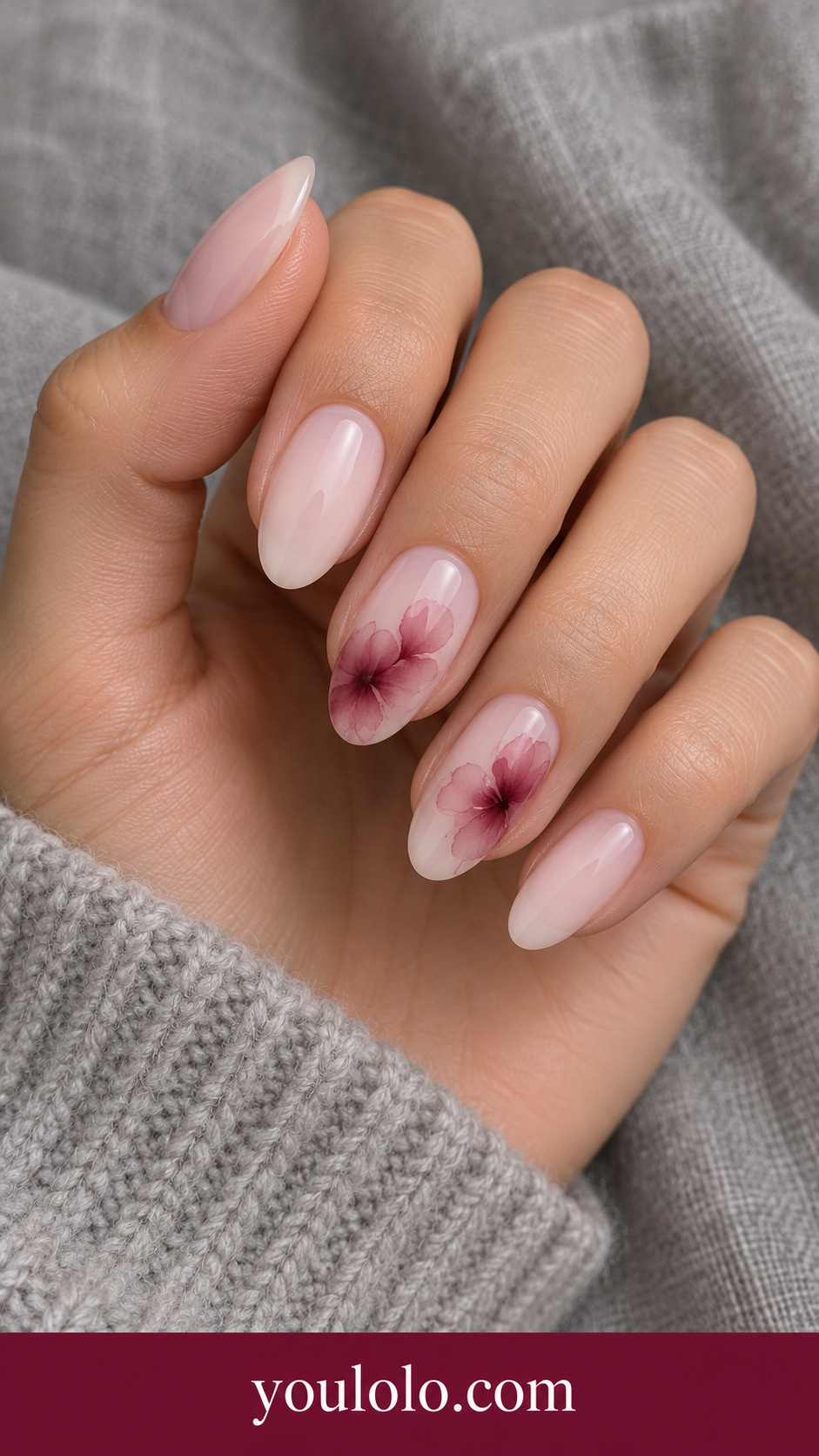 Rose Ink Bloom: medium oval milky blush nails two accents soft burgundy watercolor ink blooms with translucent feathered edges on a naturally posed adult hand
