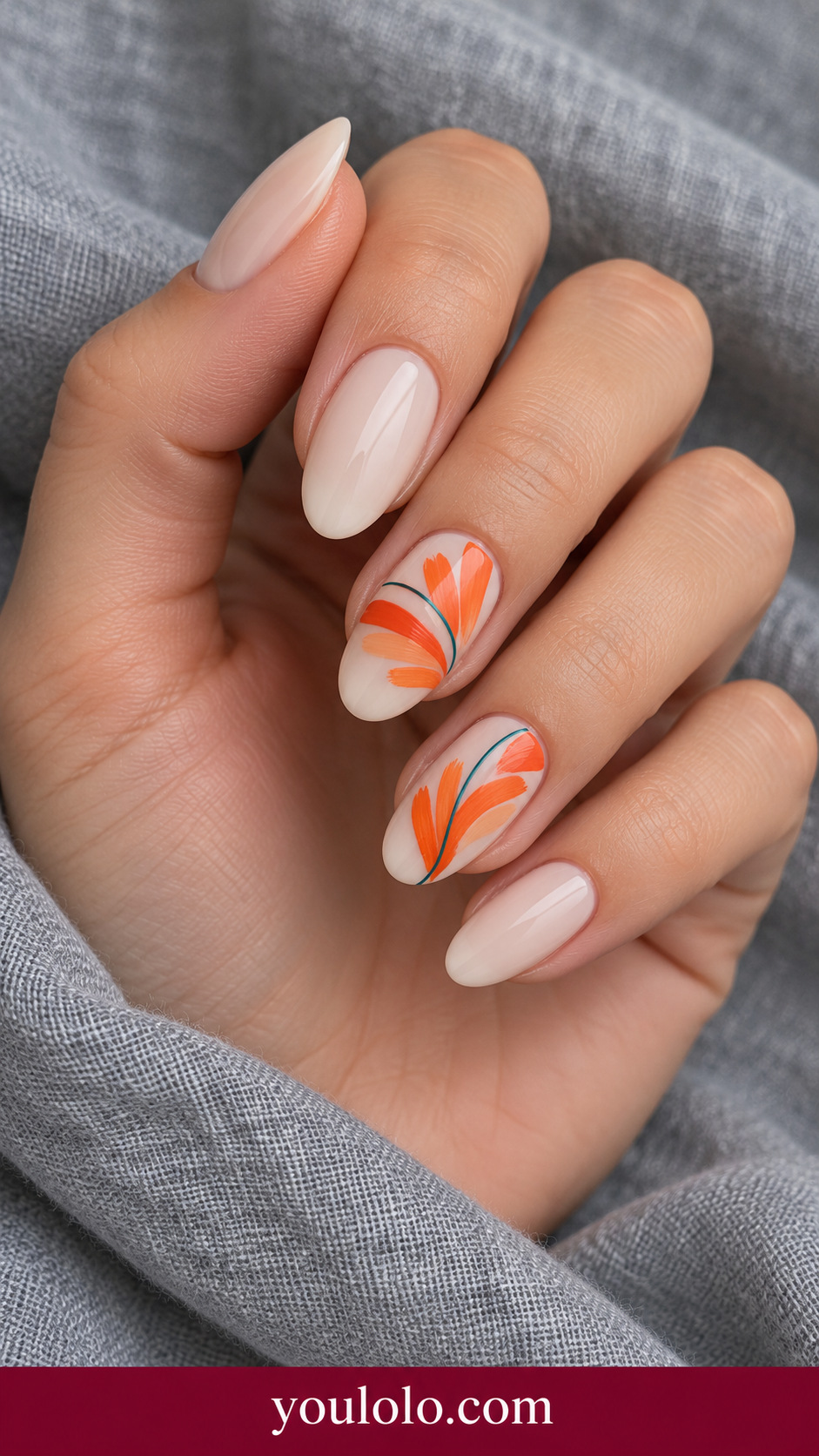 Papaya Brush Fan: medium oval cream nude nails two accents flat orange papaya abstract brush fan with fine teal single line on a naturally posed adult hand