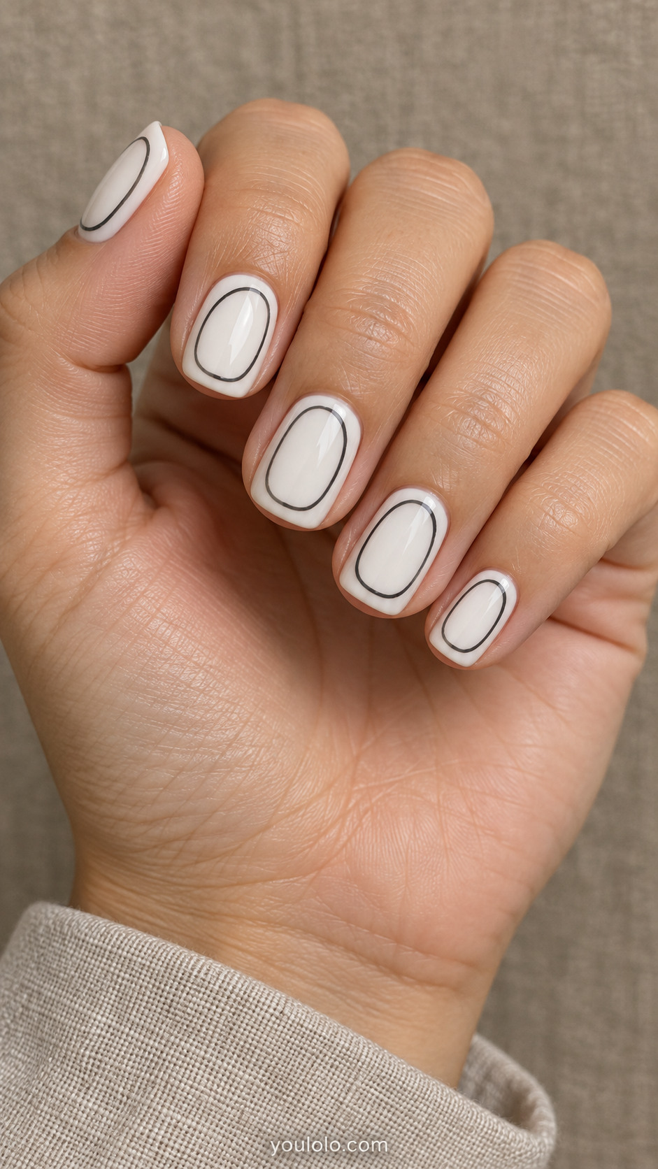 Short white squoval nails with thin charcoal oval contour lines