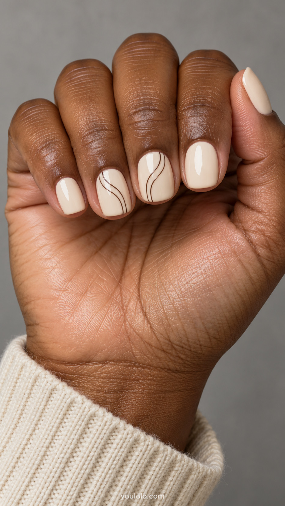 Short squoval nails: oat milk opaque nails, two extremely fine espresso wavy contour lines on middle and ring only.