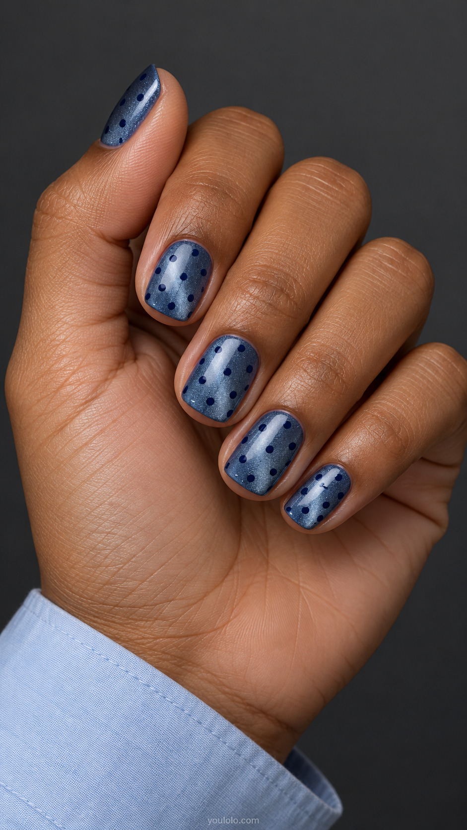 Silver Velvet, Ink-Blue Dots manicure on short squoval nails.