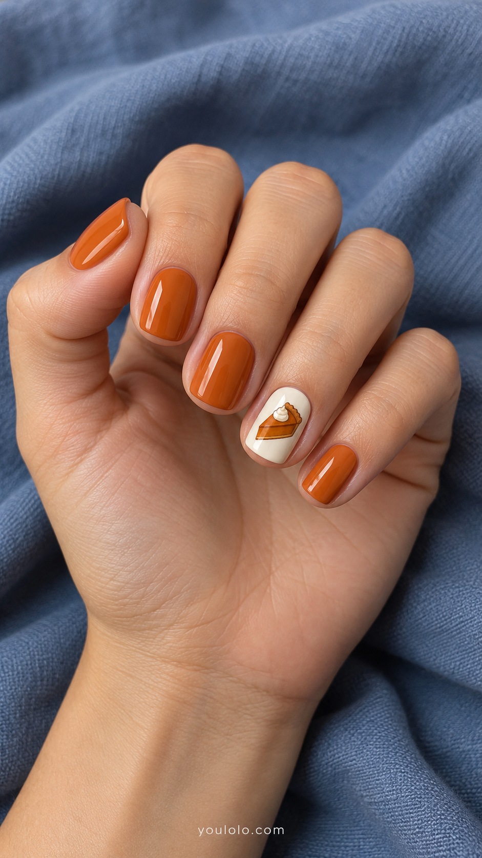 Short squoval nails muted pumpkin orange four nails ring cream with tiny flat triangular pumpkin pie slice and cream dollop