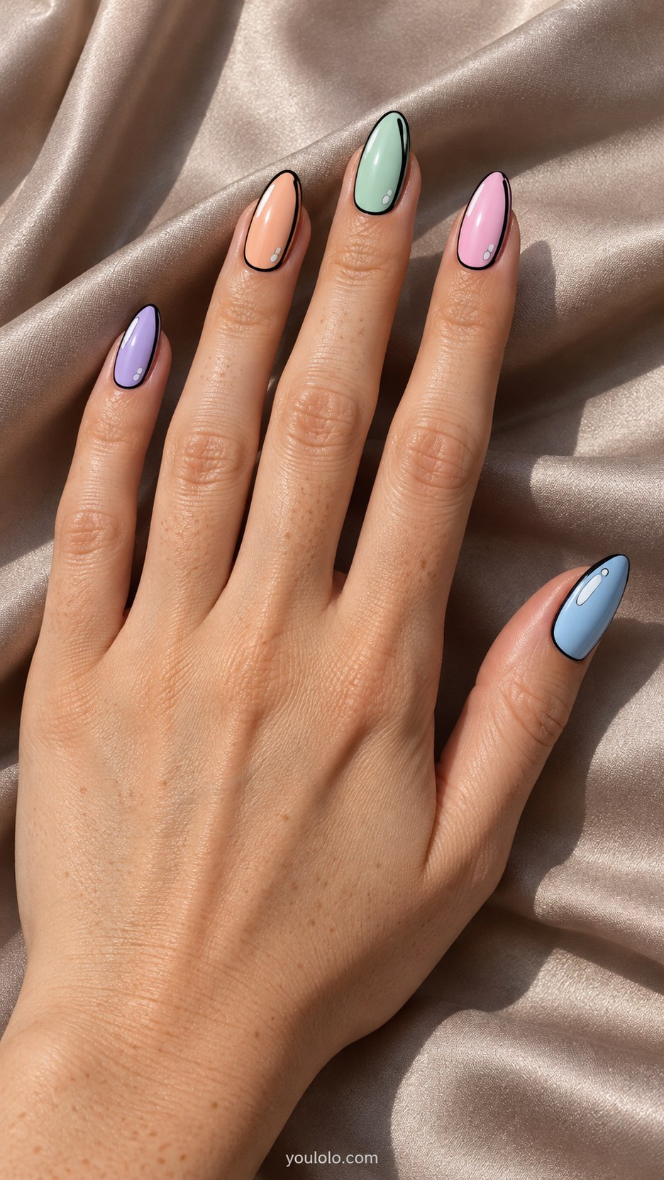 Pastel Cartoon Mix: medium almond alternating pastel lilac peach mint pink blue nails, thin black outlines and painted white comic highlights