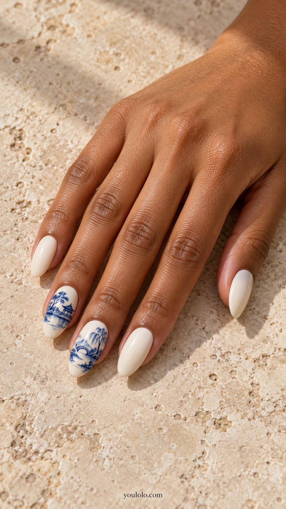 Blue Willow Landscape: medium almond ivory nails, miniature monochrome blue willow tree and bridge landscape on two nails