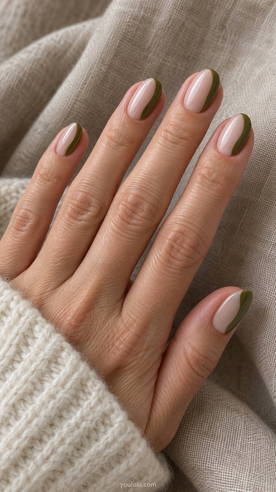 Short Almond Nail Designs: Soft Olive Side Sweep manicure on a naturally posed hand