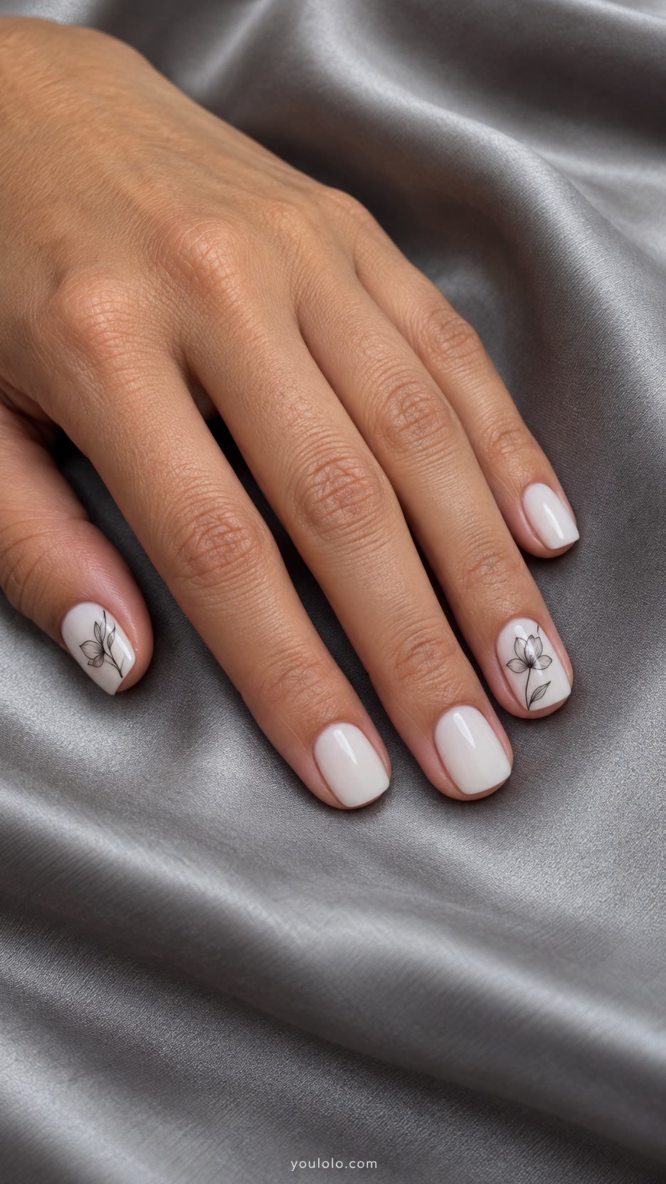 Short Artsy Nails: Ink Sketch Florals manicure on a naturally posed hand