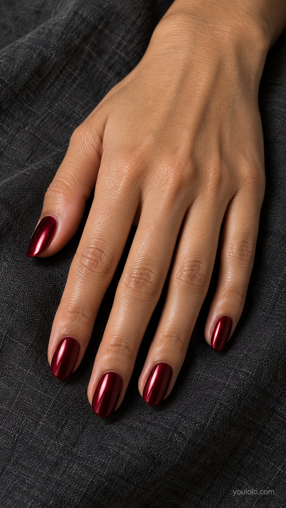 Burgundy Chrome fall chrome nails — rich wine burgundy with a smooth matching red chrome sheen, no black; medium oval nails