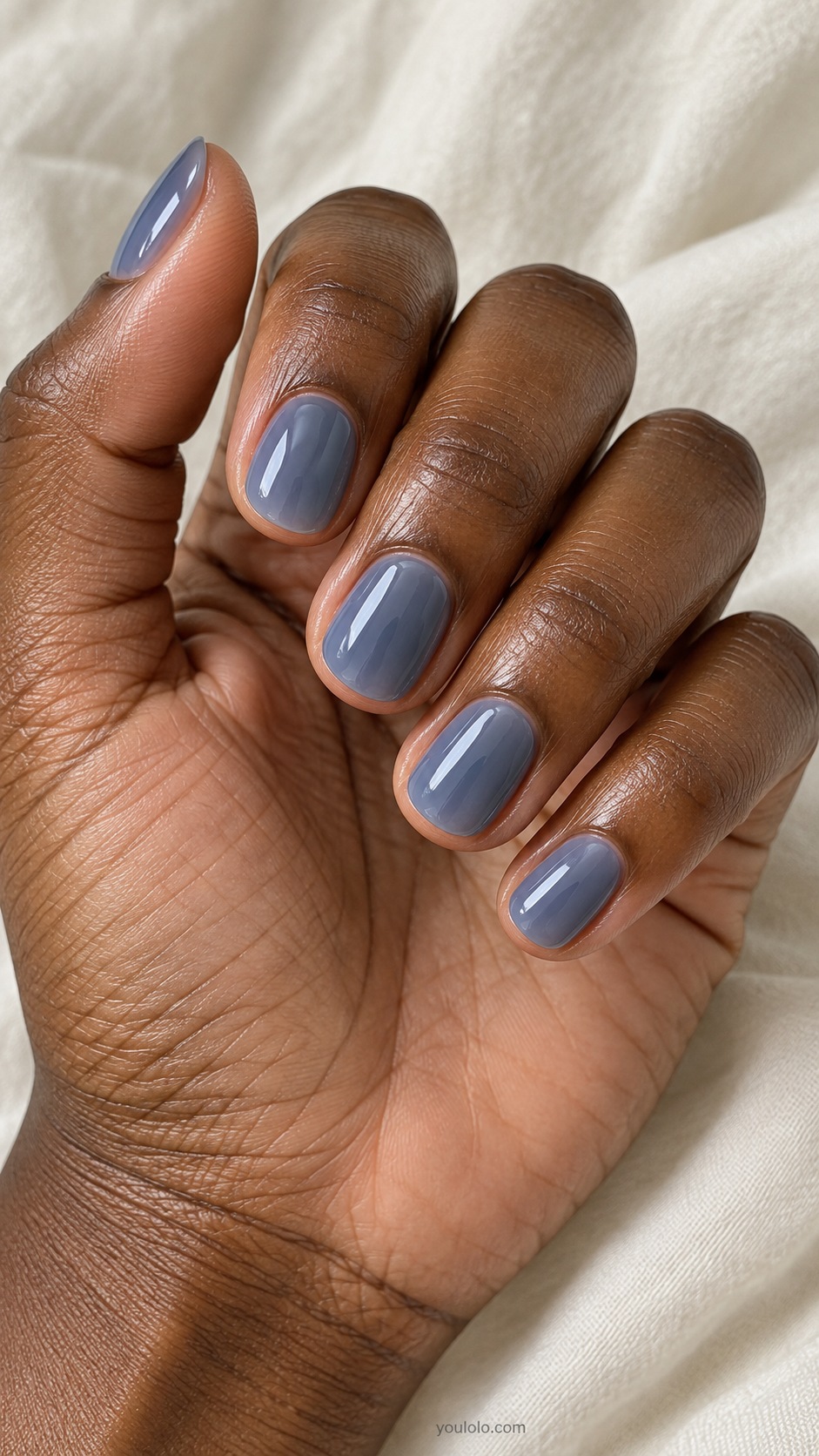 Short round nails muted slate blue translucent jelly gloss
