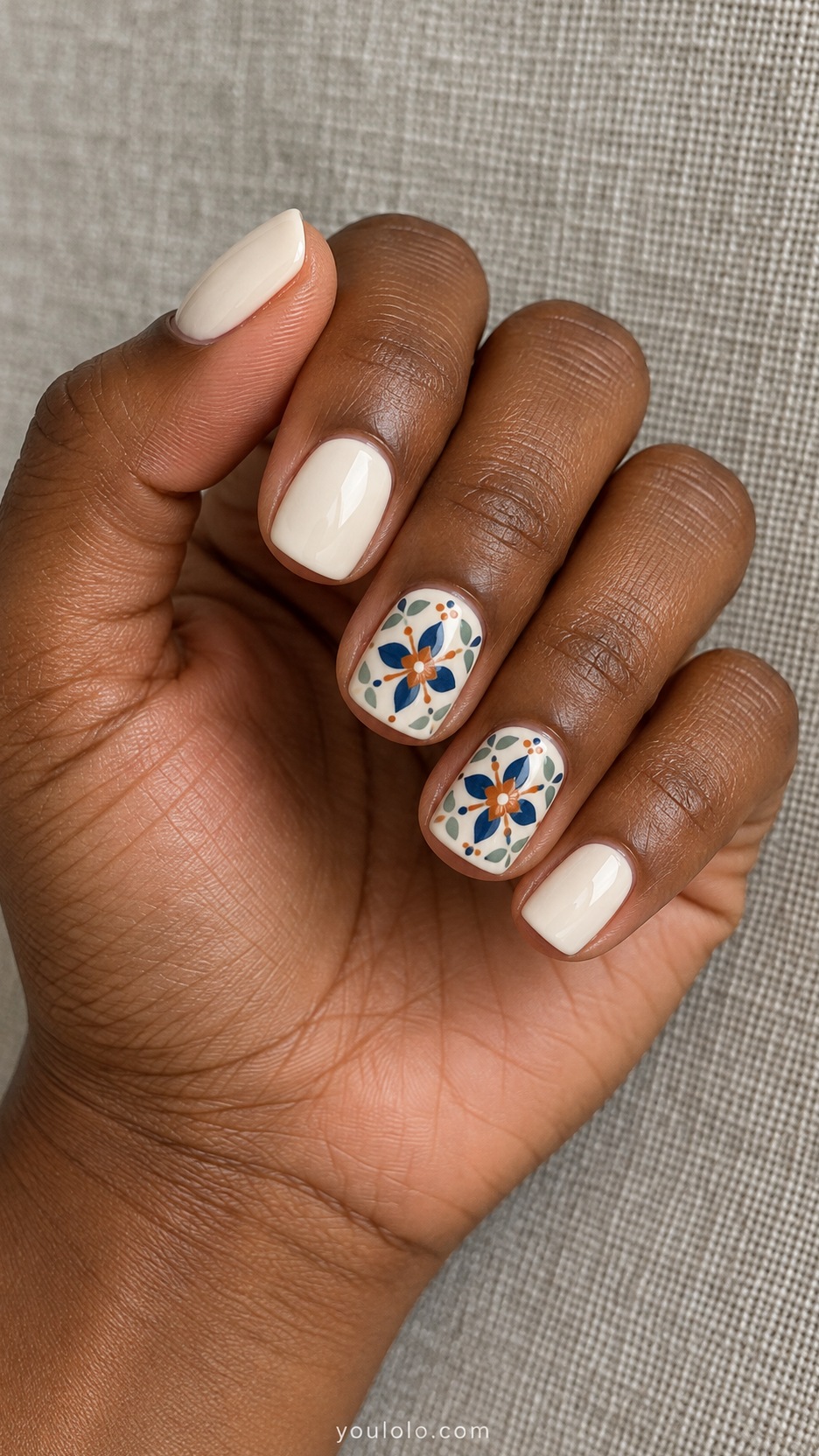 Short Artsy Nails: Tiny Ceramic Tiles manicure on a naturally posed hand