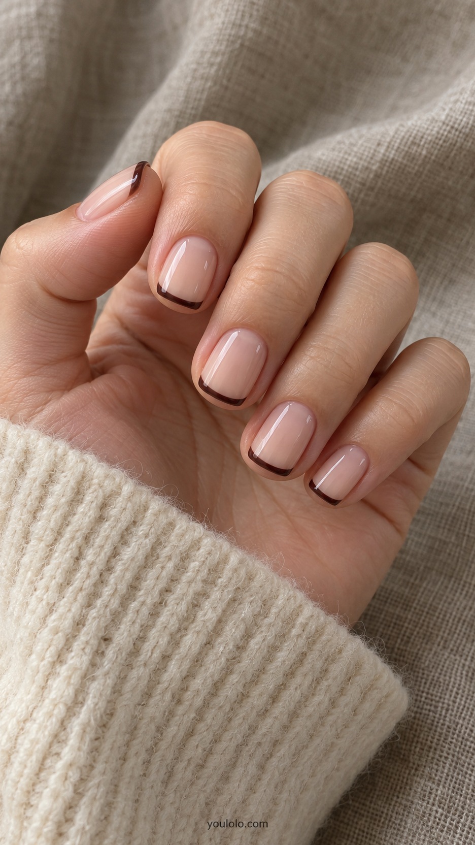 Short Press-On Nails: Espresso Slim French manicure on a naturally posed hand