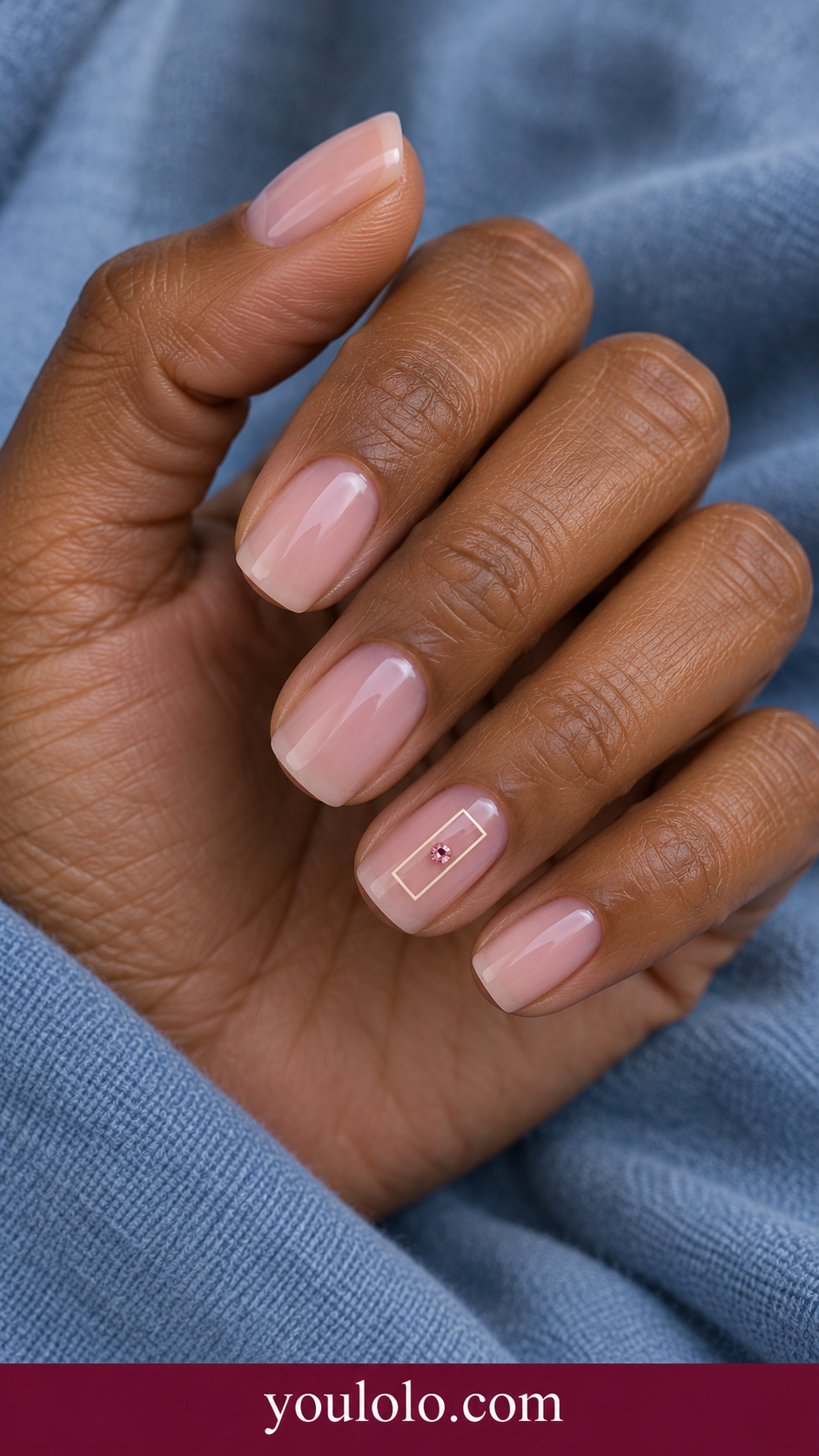 Pink Blush Tiny Frame: short soft square sheer rosy nails ring nail thin ivory miniature rectangular frame with single tiny pink gem inset on a naturally posed adult hand