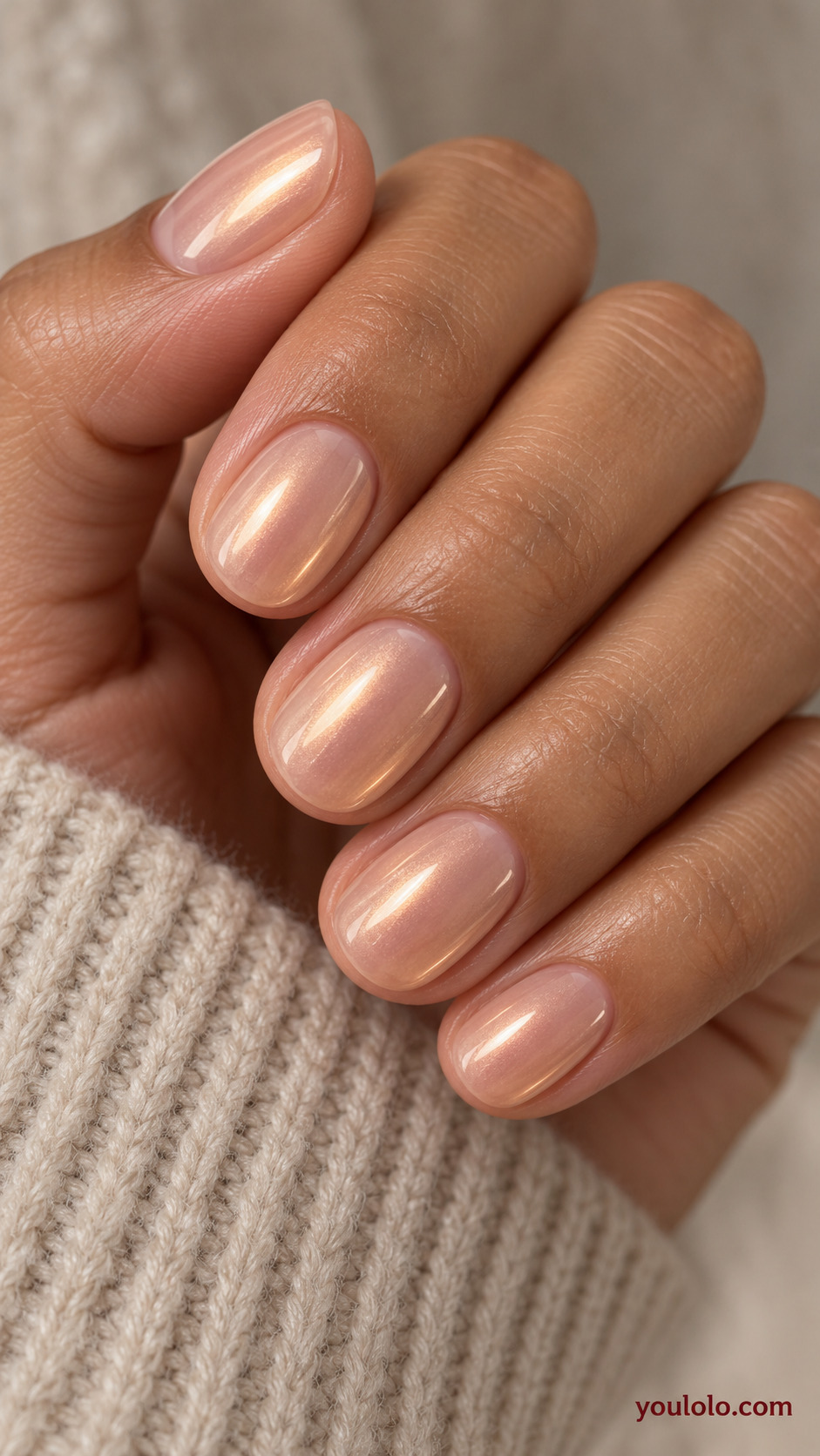 Peach Glaze on Soft Ovals on a naturally gathered feminine hand showing the nail finish