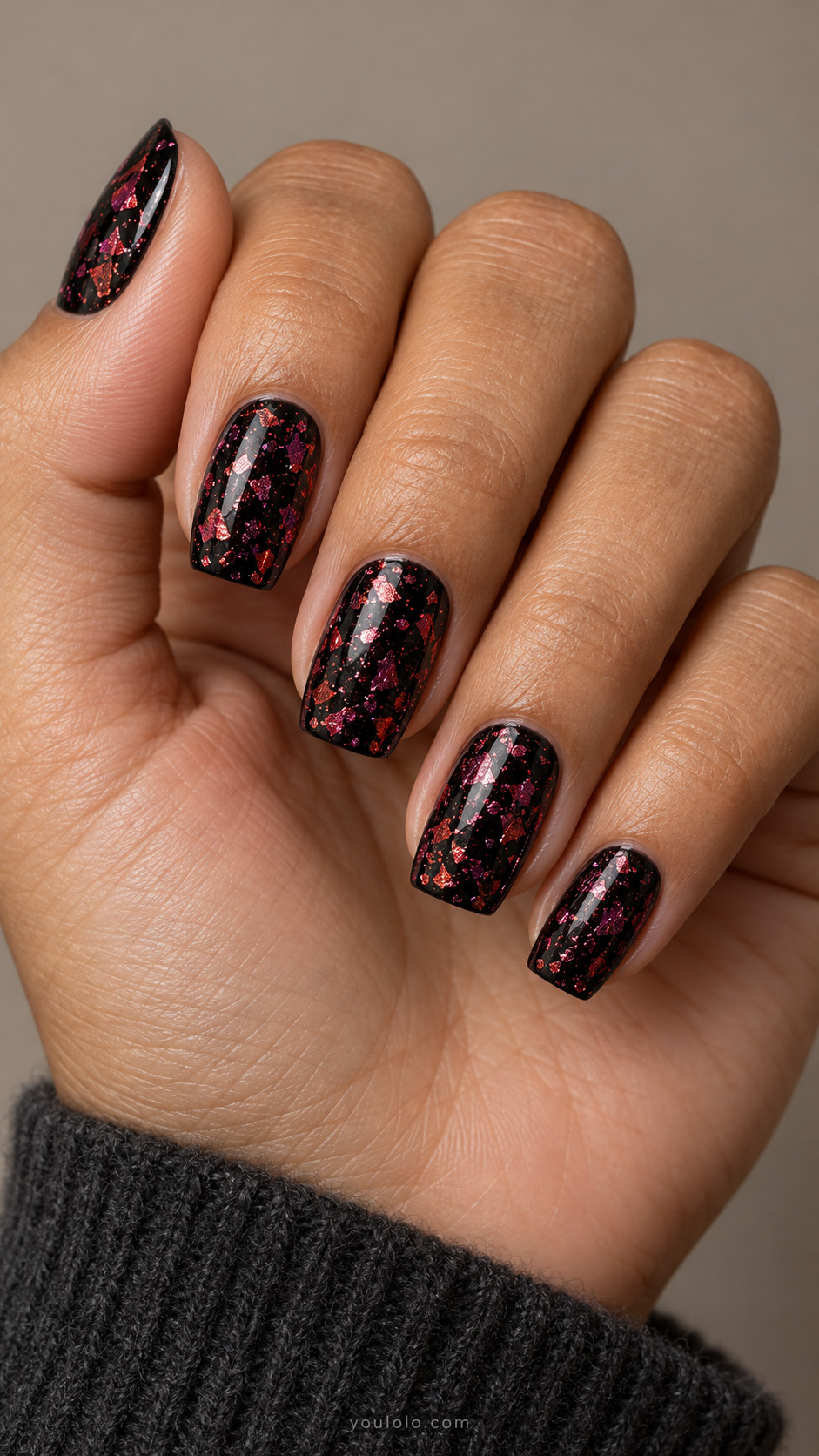 Black tapered square nails with irregular red metallic flakes