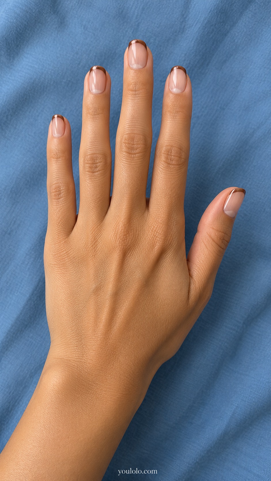 Short oval translucent neutral glazed nails very narrow cocoa brown pearlescent french tips