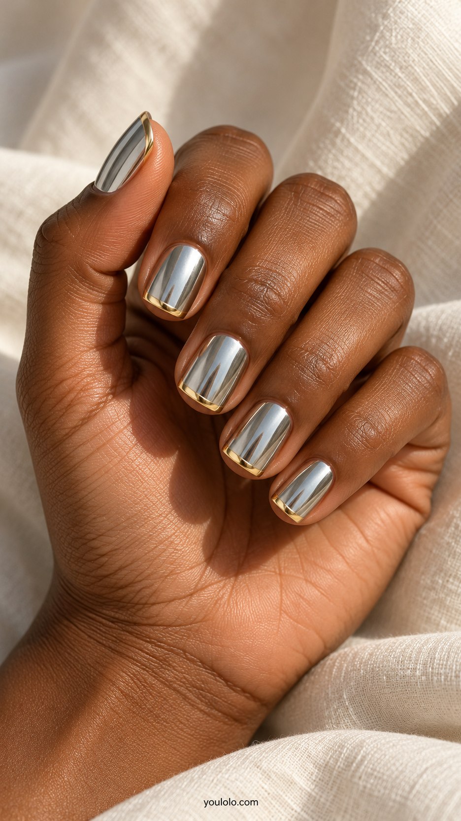 Silver Chrome Gold Edge: short square silver chrome nails, narrow warm gold border at free edge