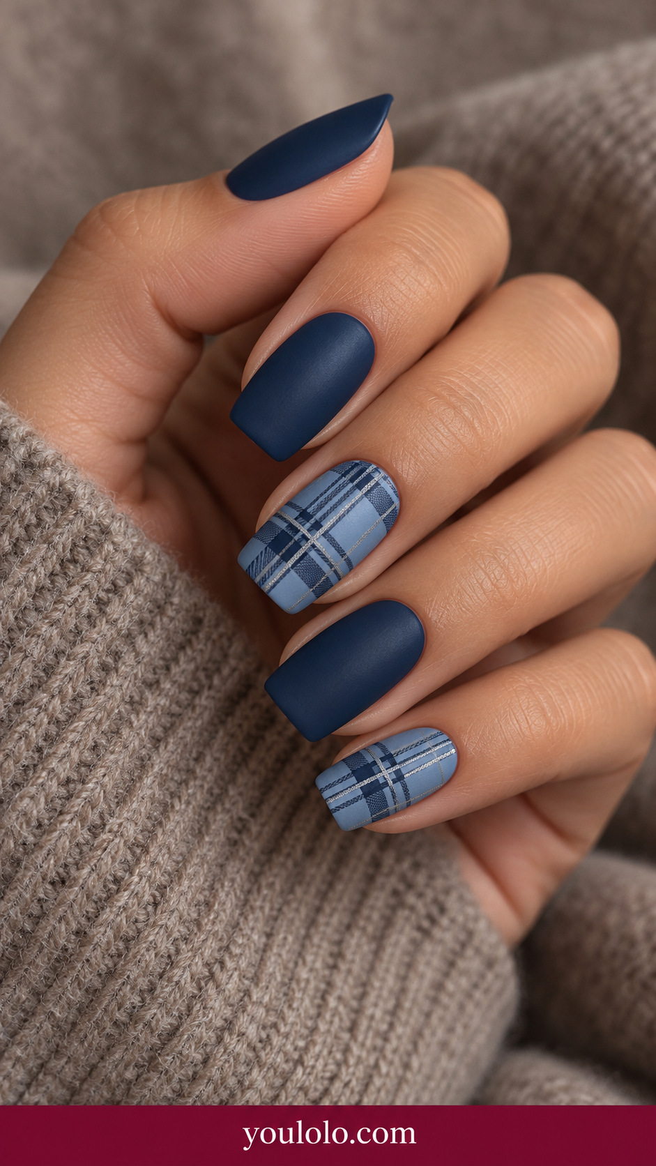 medium square navy nails two accent nails fine dusty blue and silver tartan grid, others plain navy on a naturally relaxed adult hand