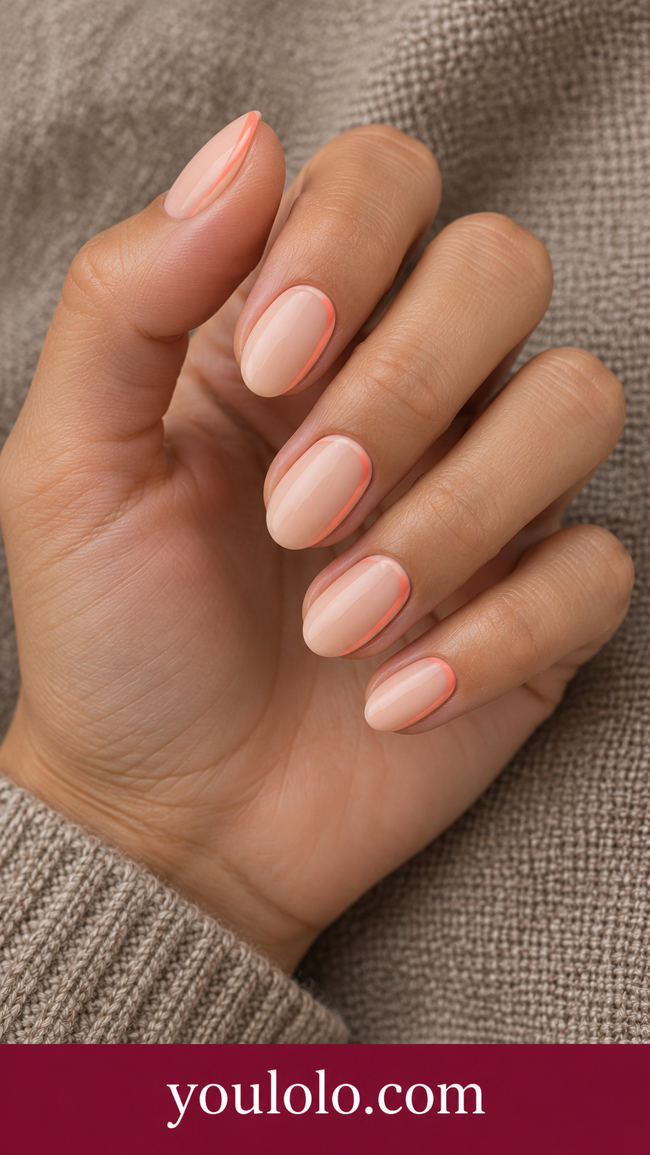 Coral Side Outline: short almond cream peach nails thin coral line following one lateral edge only on a naturally posed adult hand