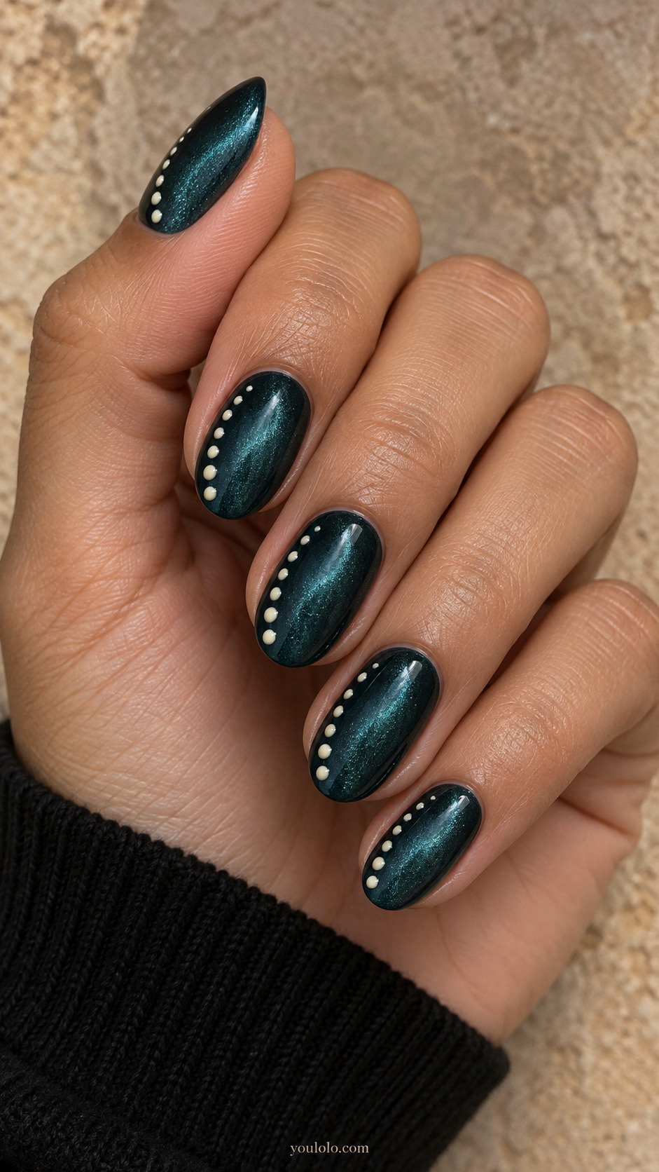 Teal Velvet With a Dotted Side Border manicure on medium oval.