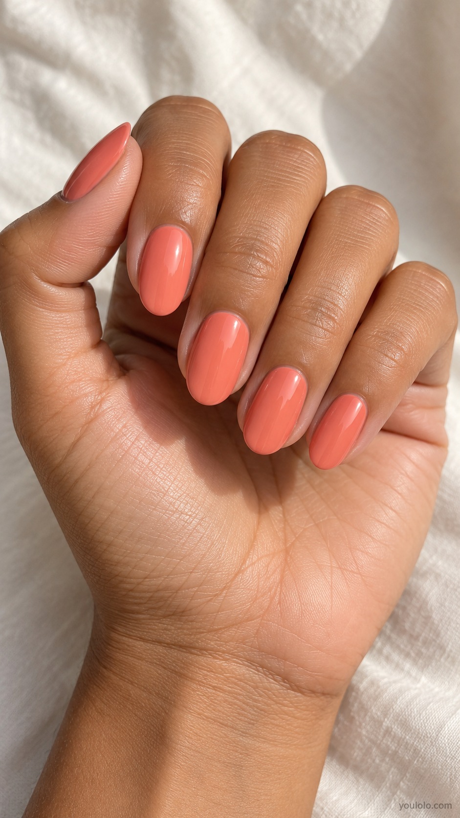 Medium oval nails dusty warm melon coral cream gloss