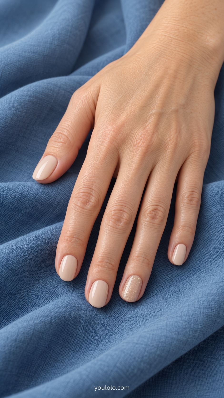 Short oval nails warm nude cream four nails ring fine pale gold shimmer