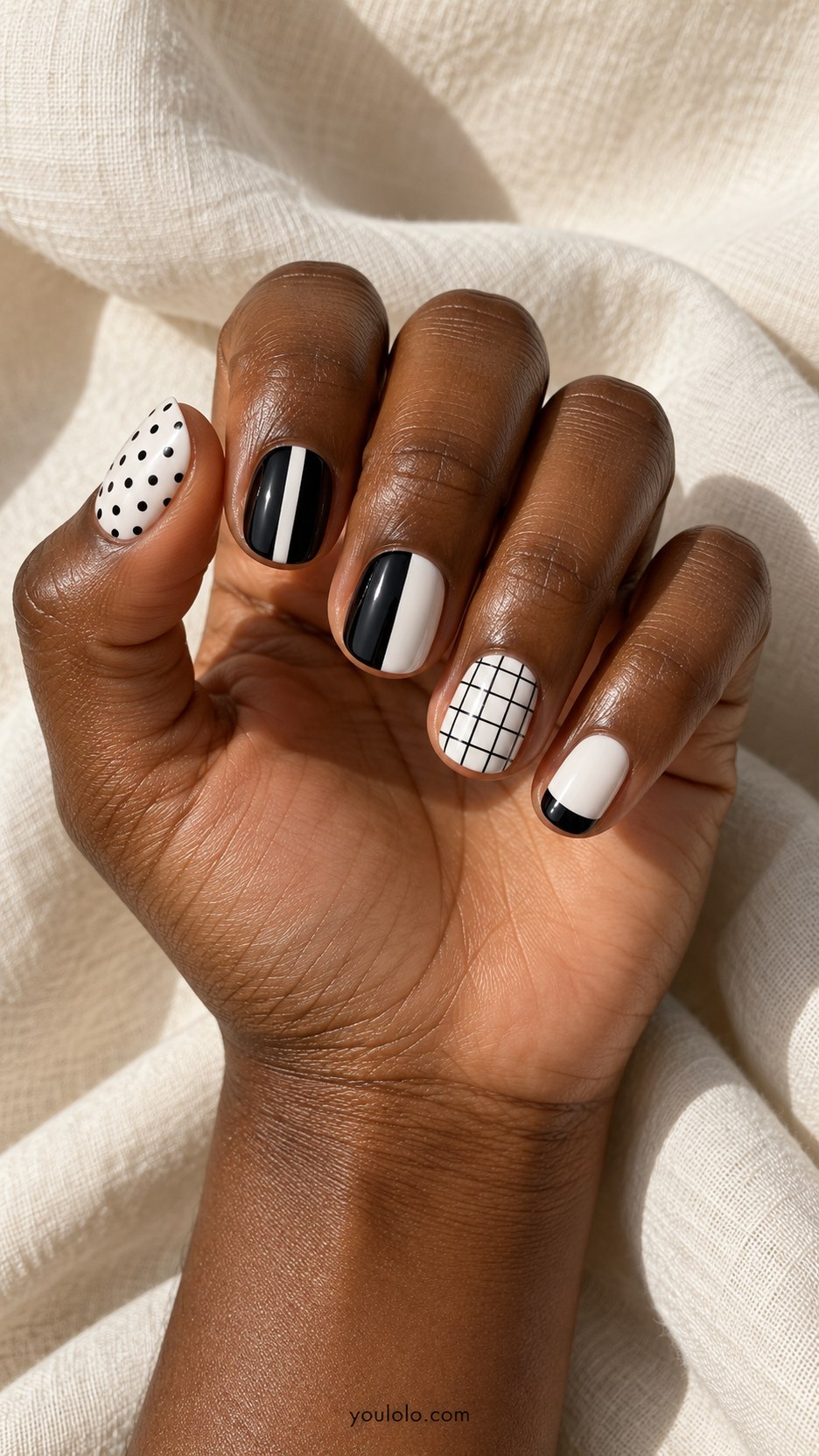 Monochrome Graphic Five: short round black white nails: dots, vertical stripe, half black, fine grid, white with black tip
