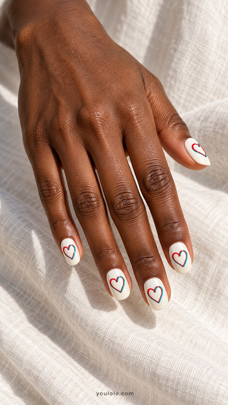 Cherry Anaglyph Hearts: short oval ivory nails, red heart outline offset slightly from cyan heart outline like 3D glasses print