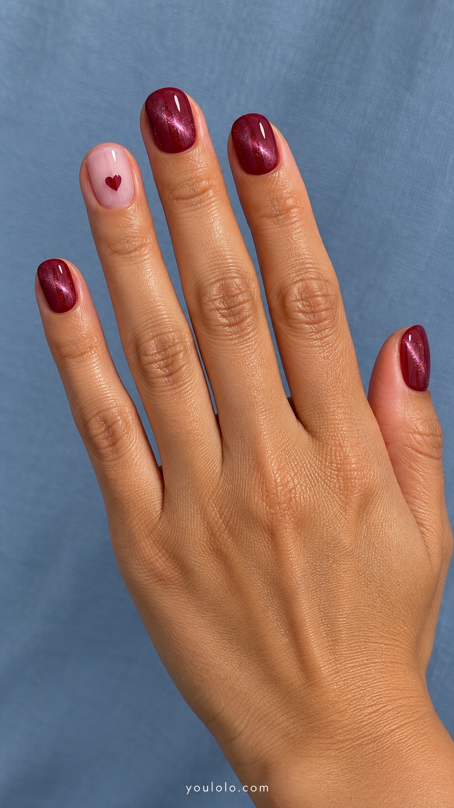 Short Red Cat Eye Nails: short round cranberry magnetic nails milky pink ring accent with tiny flat cranberry heart